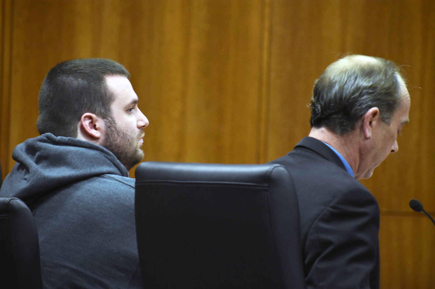 Mitchell Manthey in court with attorney